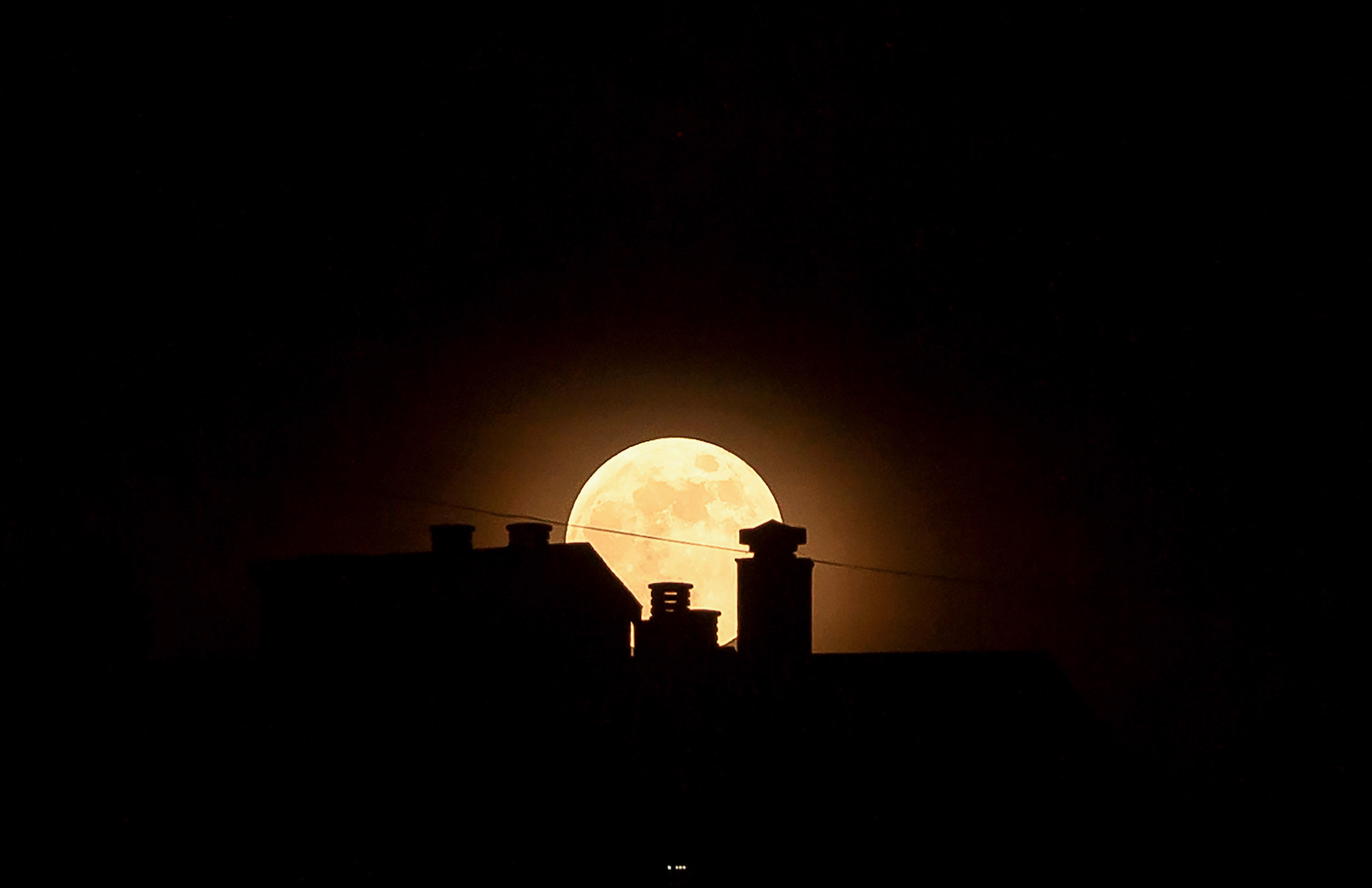 Stunning strawberry moon thrills skywatchers - Fox News