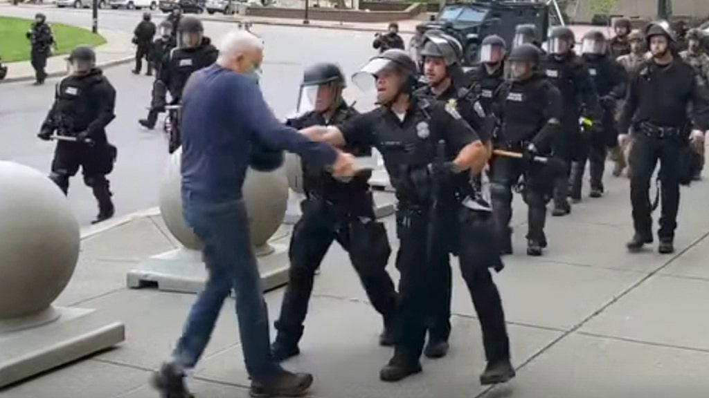 Buffalo police officers see elderly protesters pushing
