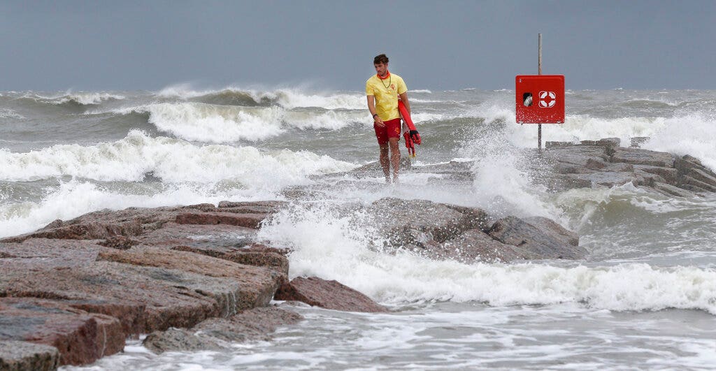 Tropical Storm Hanna was upgraded to a hurricane Saturday, moving toward the Texas coast and threatening to bring heavy rain, storm surge and possible