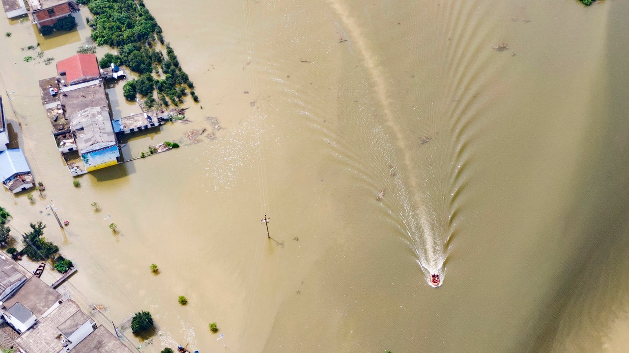 China flooding death toll rises as surging waters trigger new alerts, dam blasted - Fox News