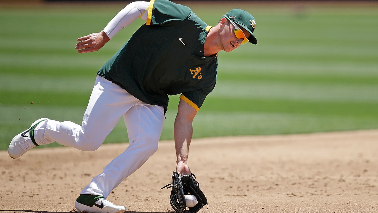 Oakland A's infielders Marcus Semien, Matt Chapman, and Matt Olson