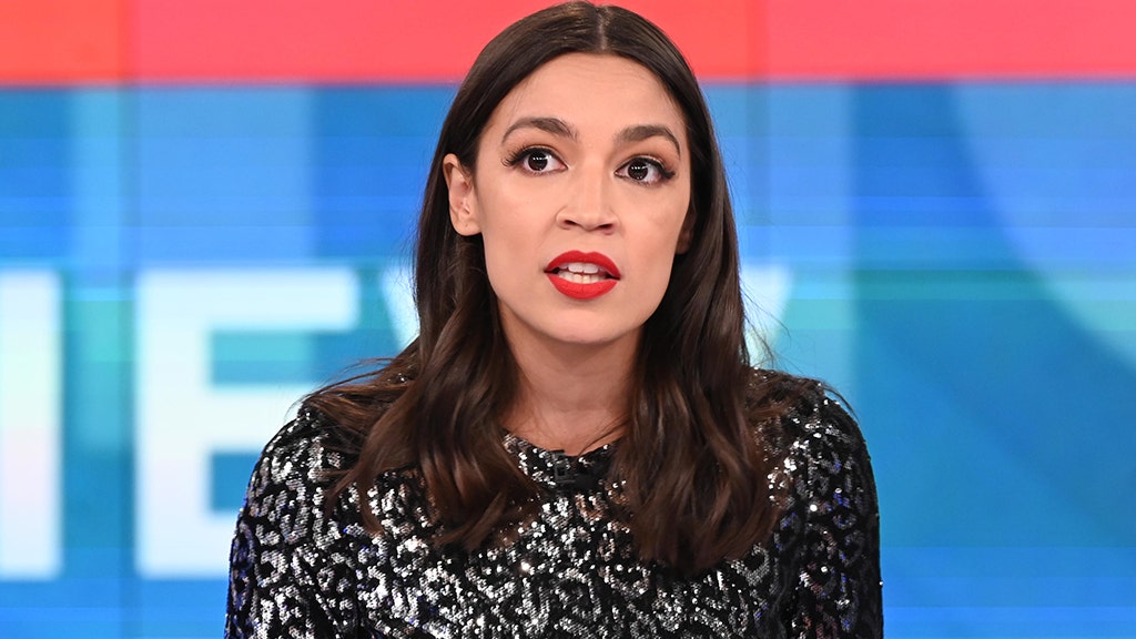 AOC in Miami Beach for 'taste of freedom' as New York sees record number of Covid cases: report