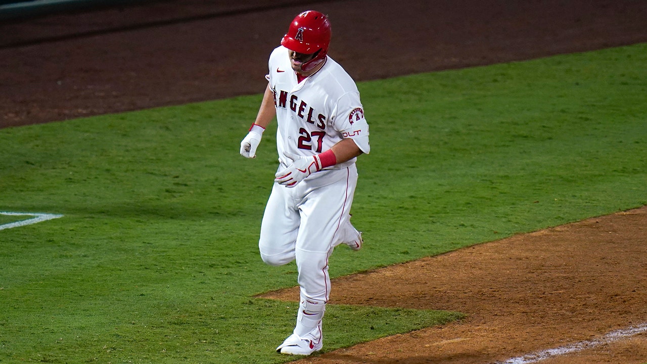 Trout homers twice, helps Angels rally for 10-9 win over A's