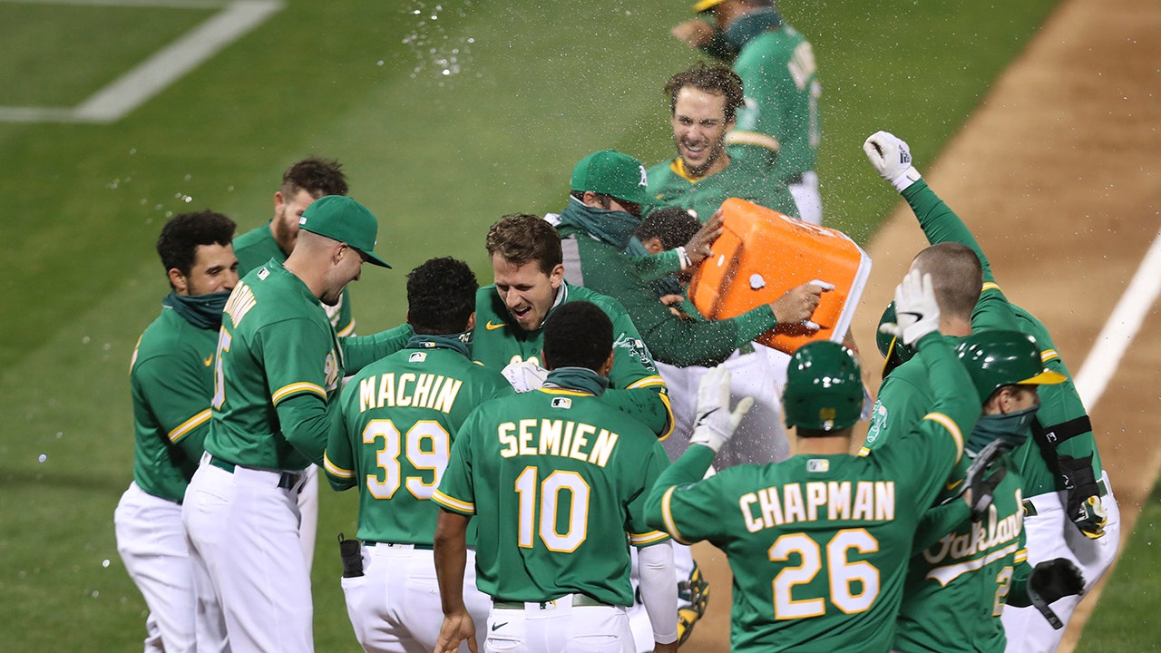 Athletics' Stephen Piscotty delivers walk-off grand slam against Rangers