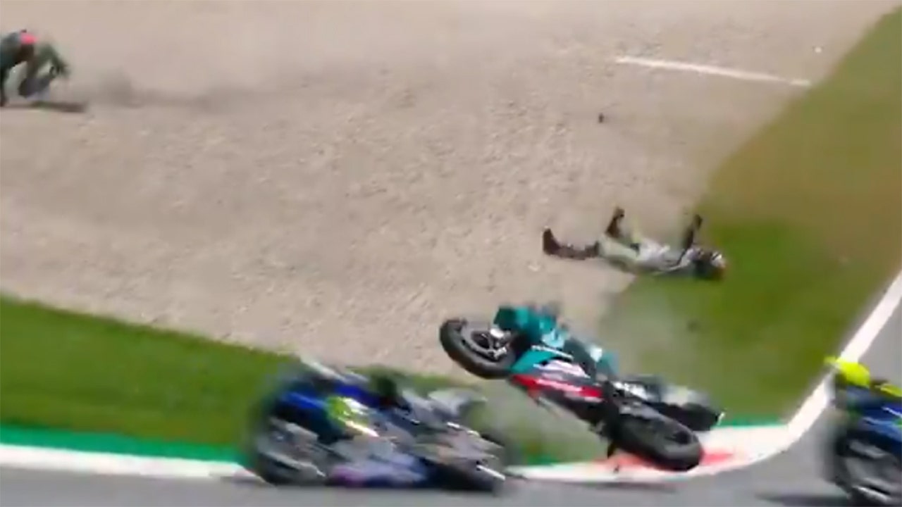 Watch MotoGP racers avoid wreck as they ride through flying motorcycles Fox News