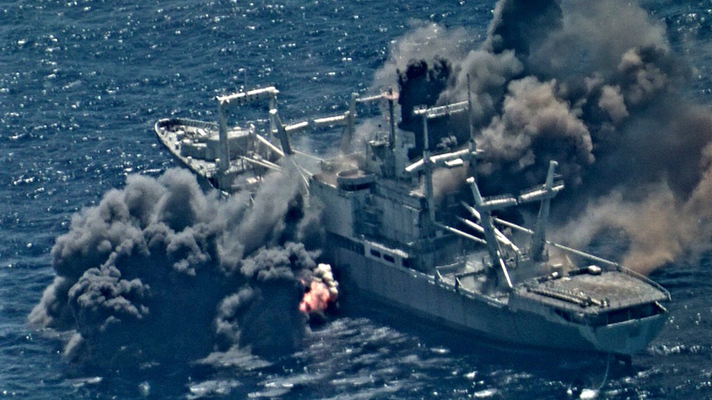 cruise ship sinks military ship