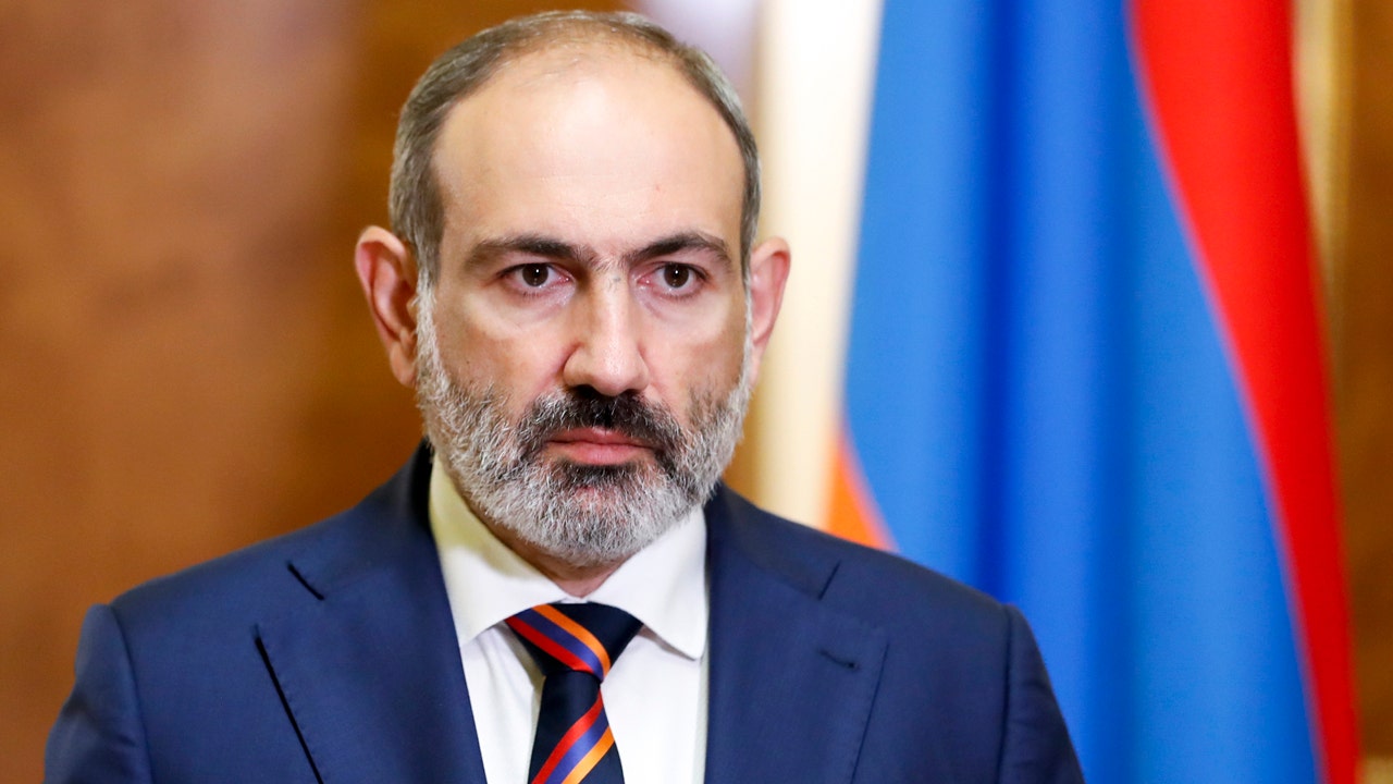 Armenian PM faces military's demand to resign, talks of coup