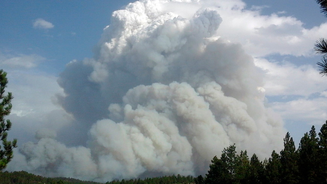 Montana wildfire skirts town, residents allowed to return home after