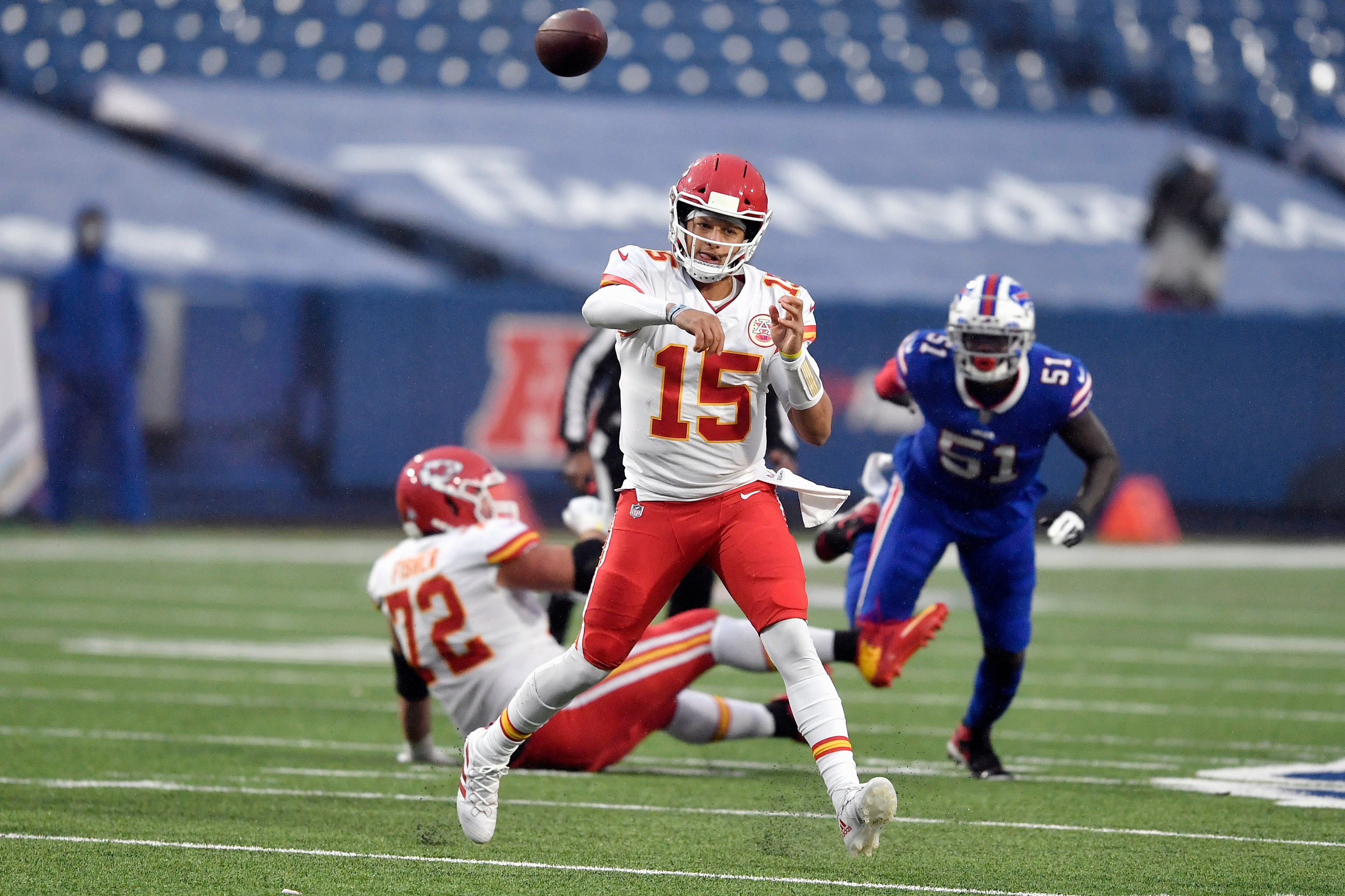 Kansas City Chiefs quarterback Patrick Mahomes (15) celebrates after  throwing a touchdown pass during the first half of an NFL divisional round  playoff football game against the Buffalo Bills, Sunday, Jan. 23