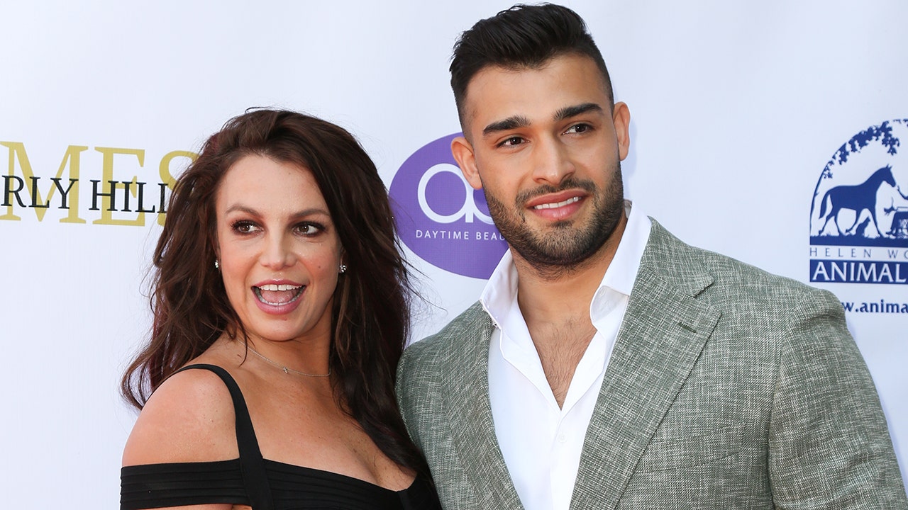 Britney Spears jokes Sam Asghari is an 'a--hole' for 'overdue' proposal before gushing over fiancé