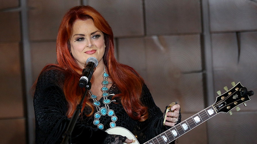 Wynonna Judd says she wept upon seeing sister Ashely Judd for the first time following her leg injury