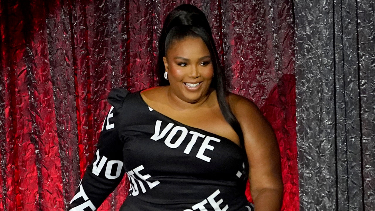 Lizzo's Vote Dress at Billboard Music Awards 2020: Photos