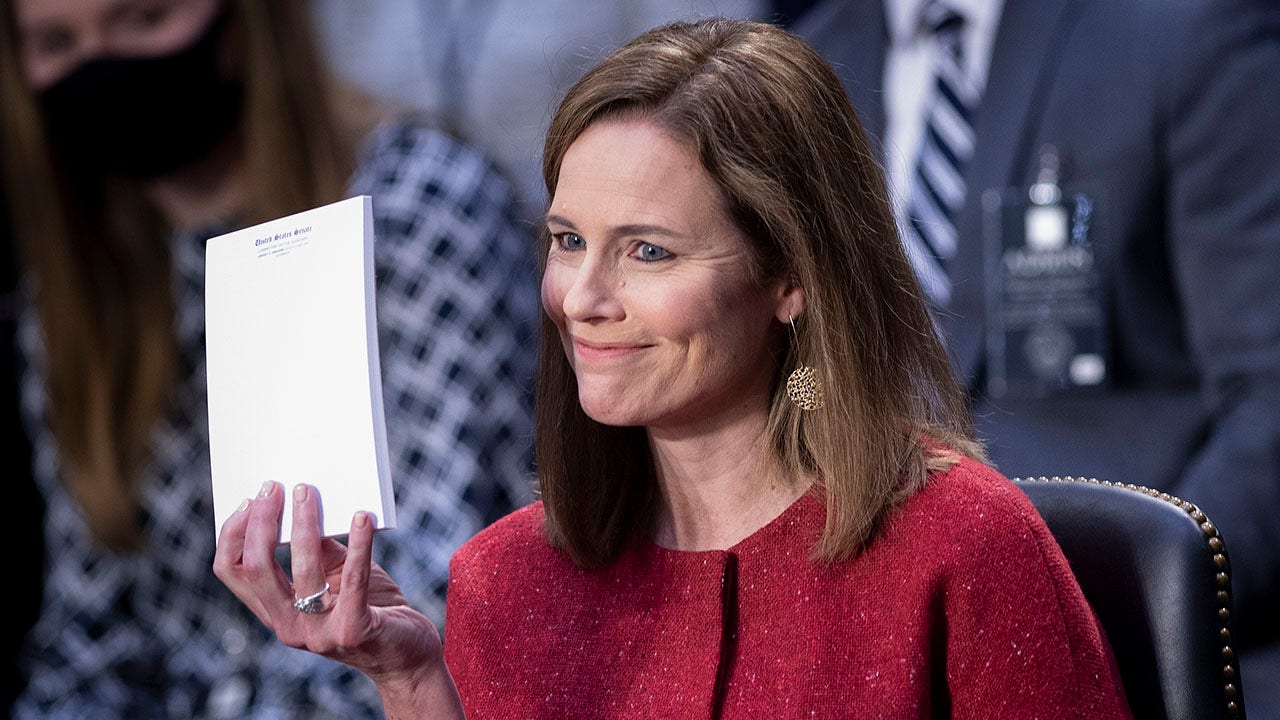 amy-coney-barrett-faces-pressure-during-hearing-responds-with-grace-and-poise-experts-say