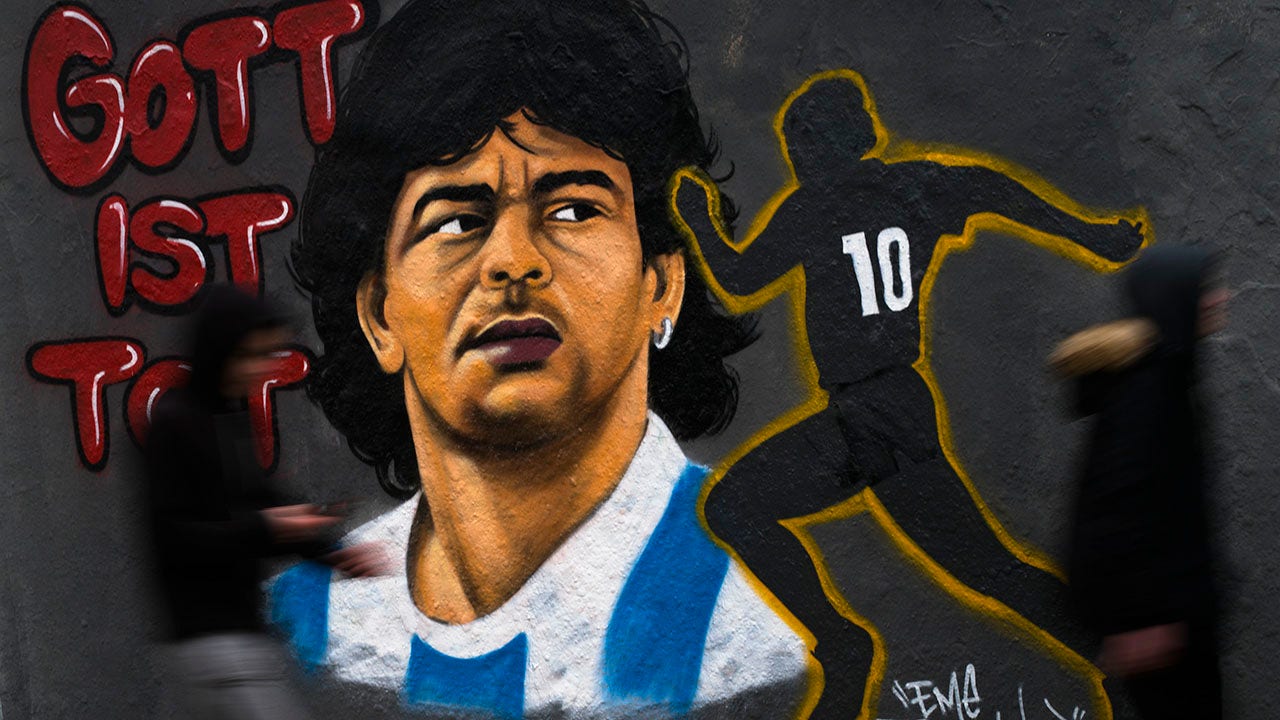 Lionel Messi and Diego Maradona ( take the ball ) by Bert Hooijer on  canvas, poster, wallpaper and more