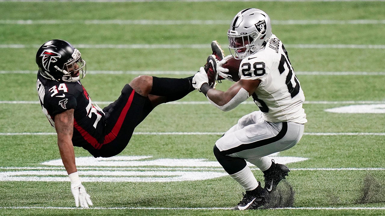 Raiders' Josh Jacobs delivers huge hit on would-be Falcons tackler but is  penalized