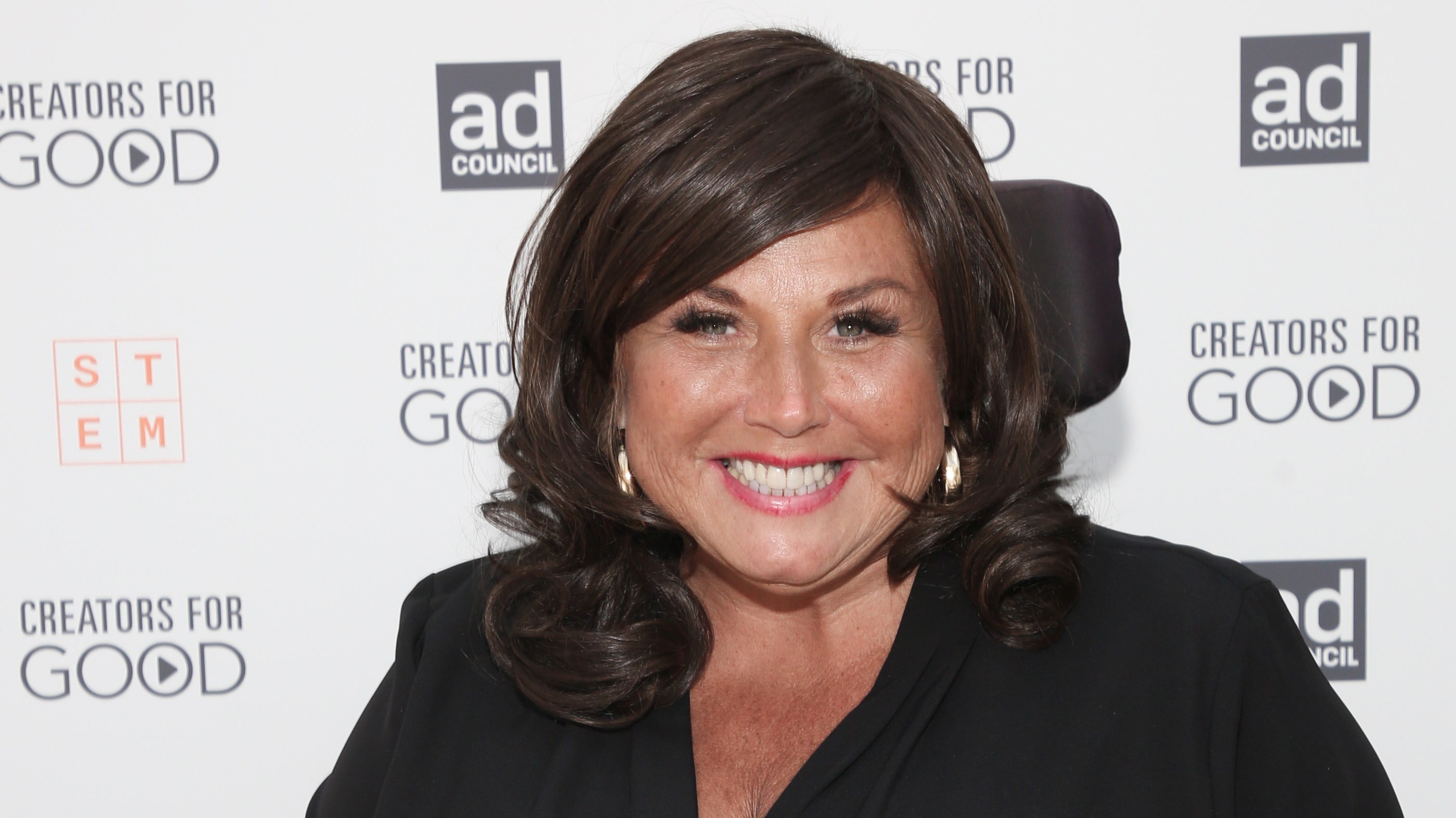 Why is Abby Lee Miller using a wheelchair?