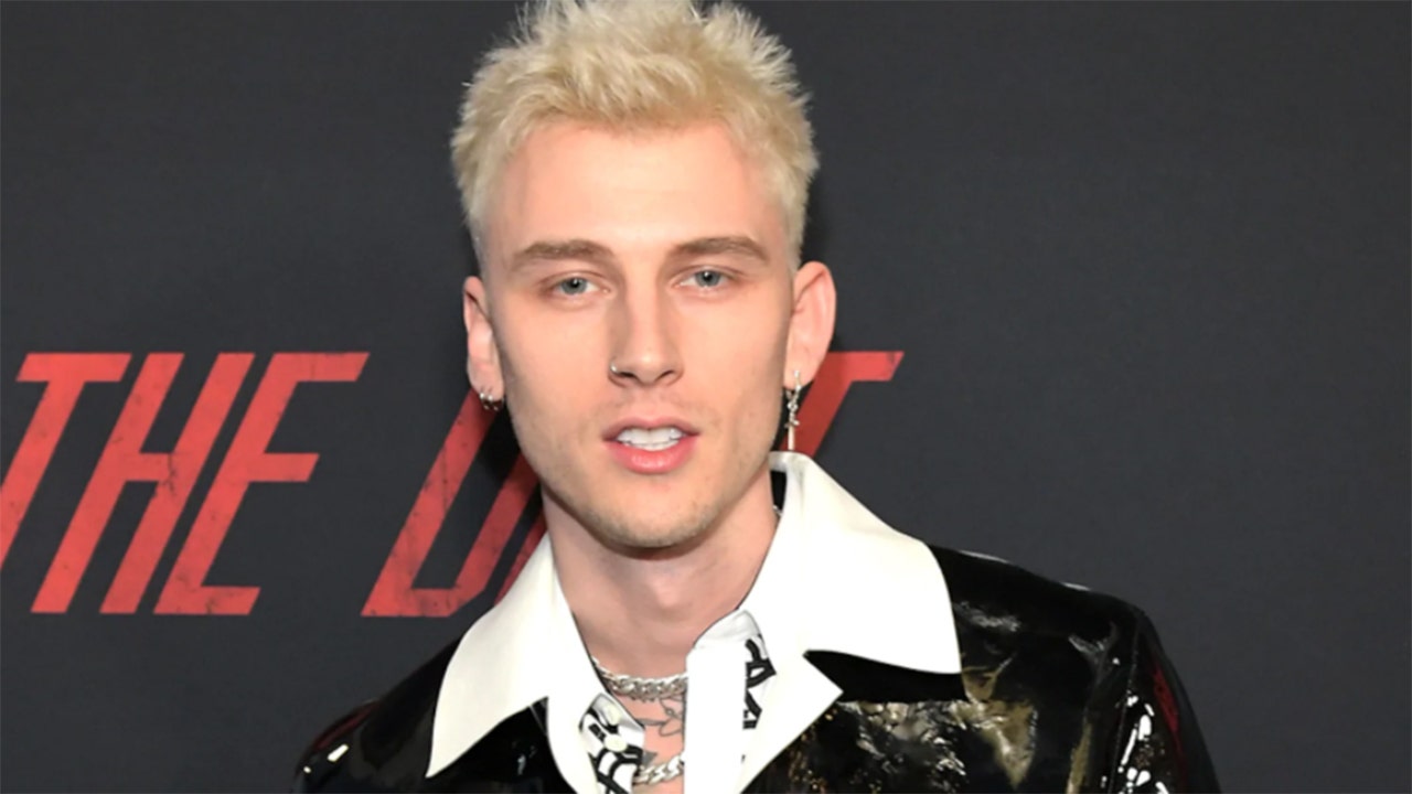 Machine Gun Kelly fights with audience member who shoved him at at Louder Than Life Festival