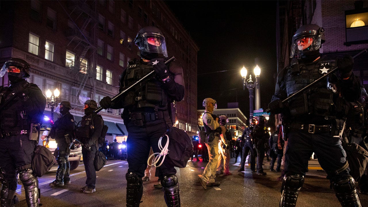 Police in Portland declare riot as the city’s unrest enters new year