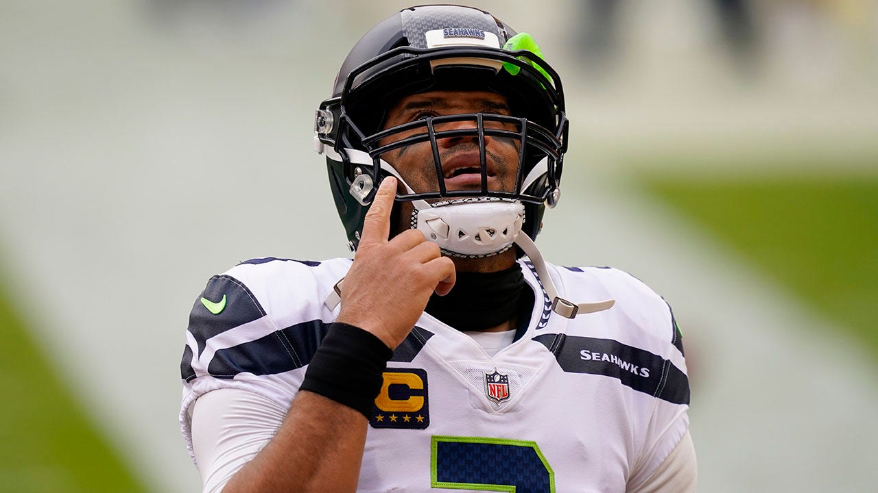 Seahawks' Russell Wilson Reports To OTAs