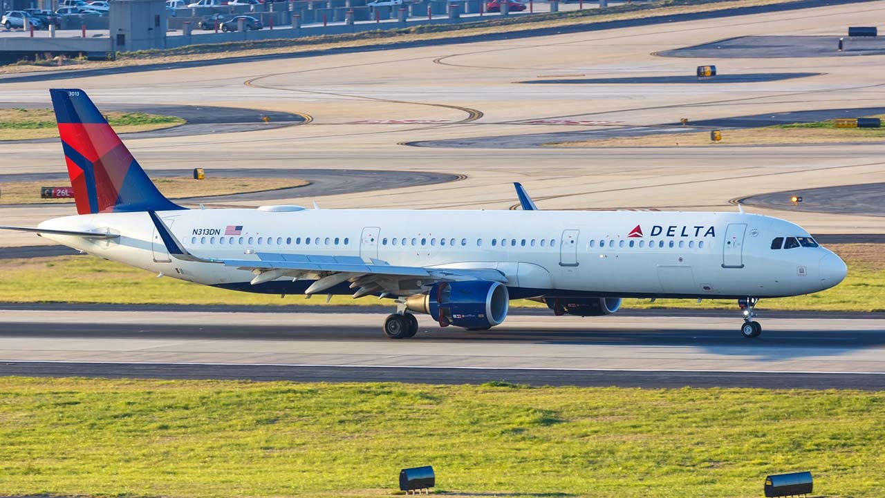 Delta passenger who slipped from the emergency exit said he was suffering from a panic attack