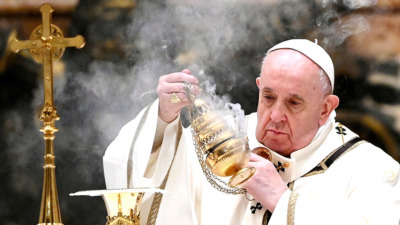 Pope Francis celebrates low-key Christmas Eve Mass amid restrictions on coronavirus