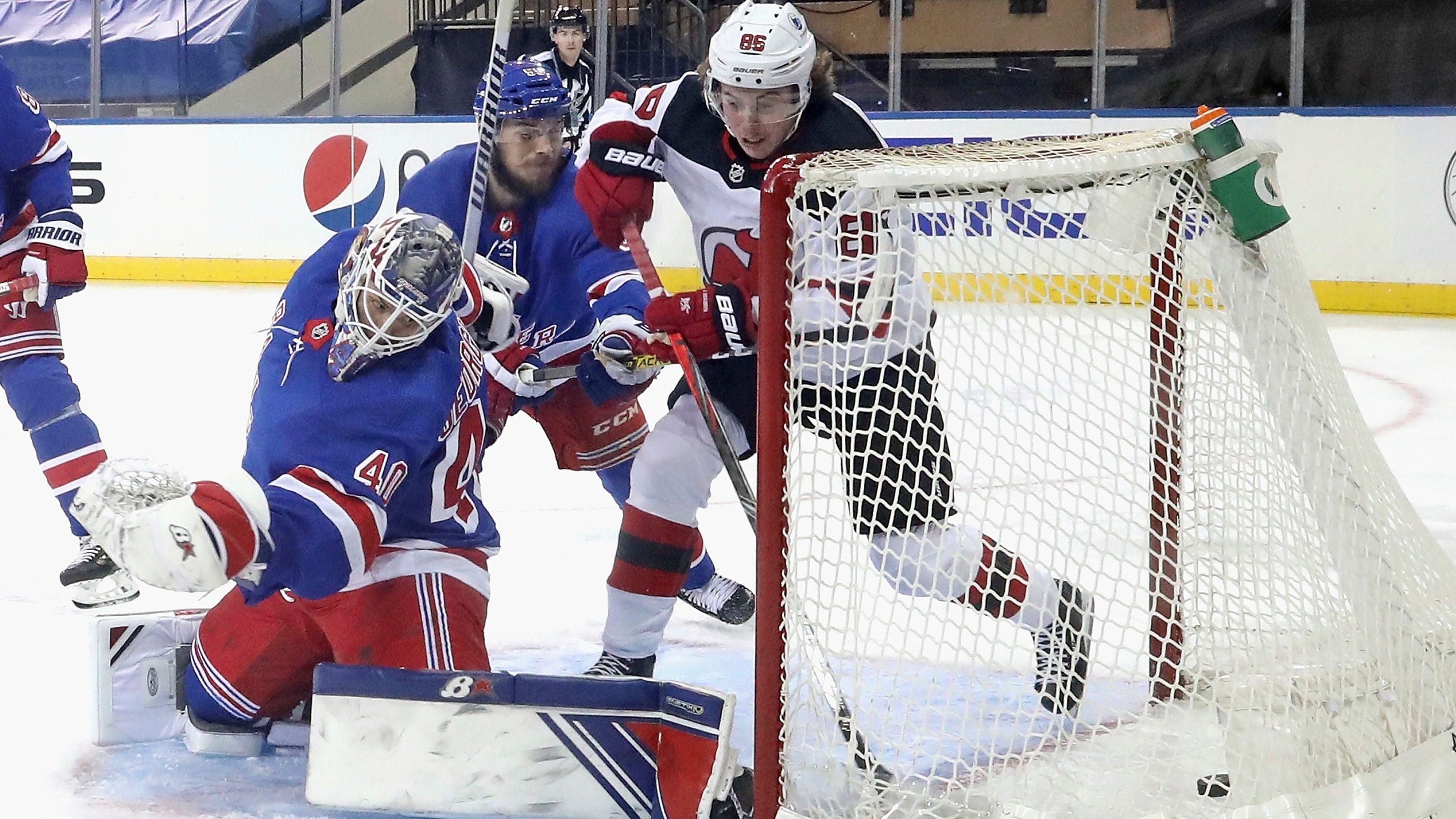 Hughes has 3 points in 2nd period as Devils beat Rangers 4-3