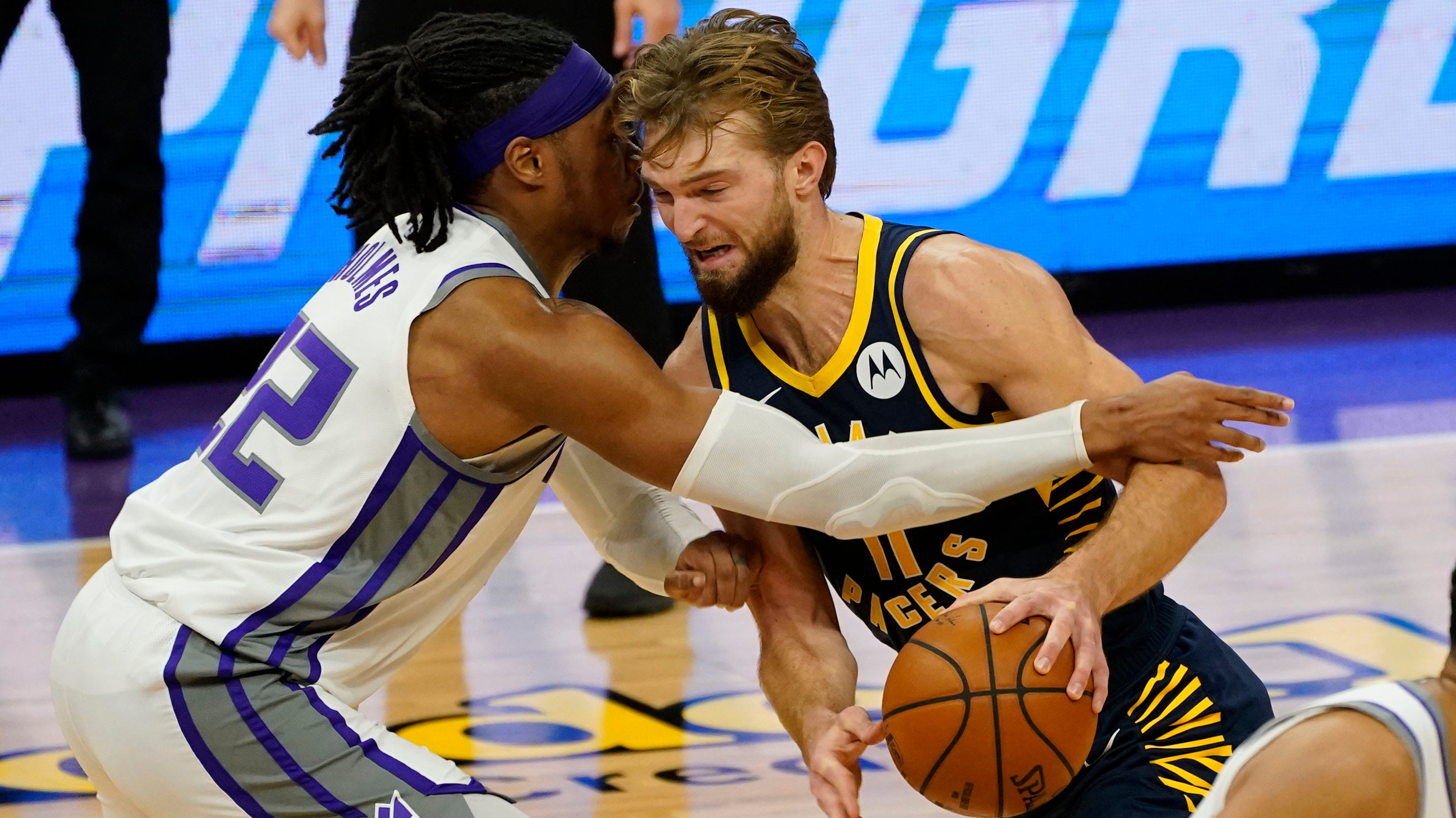 Kings hold off Pacers 127-122 with replay help