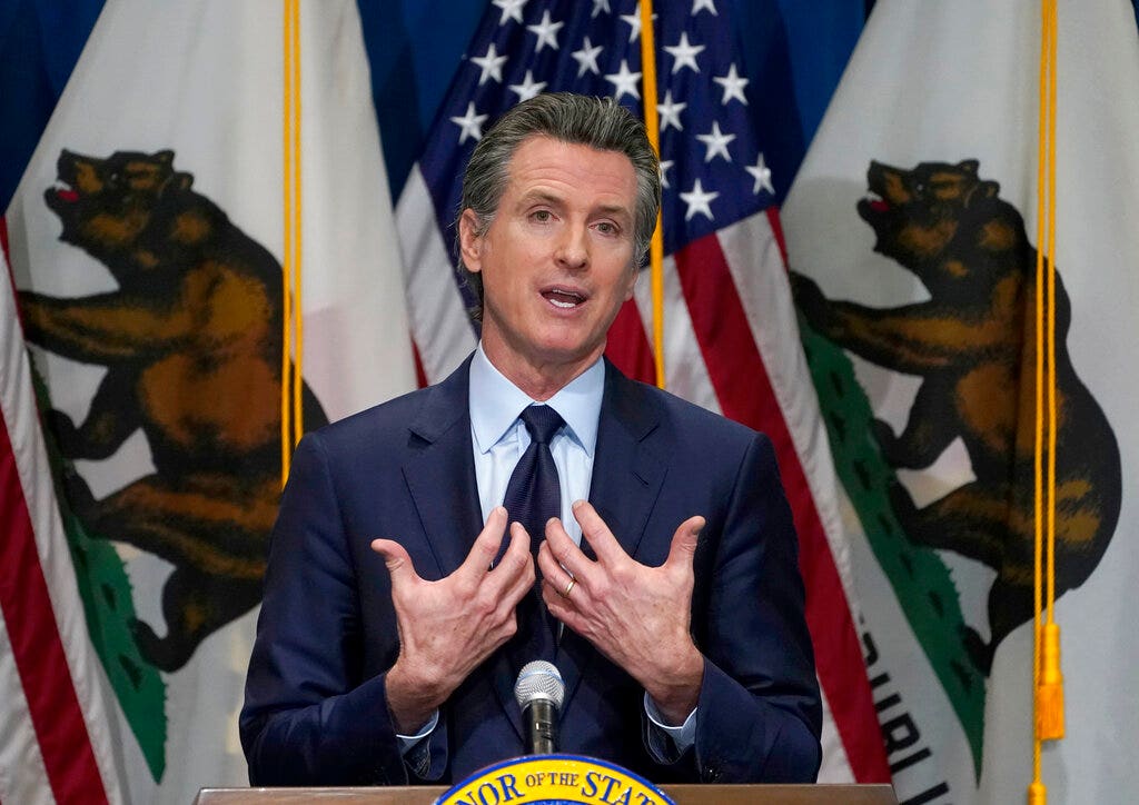 California Governor Gavin Newsom, facing a Republican-led recall, criticized by Democrats over the COVID-19 response