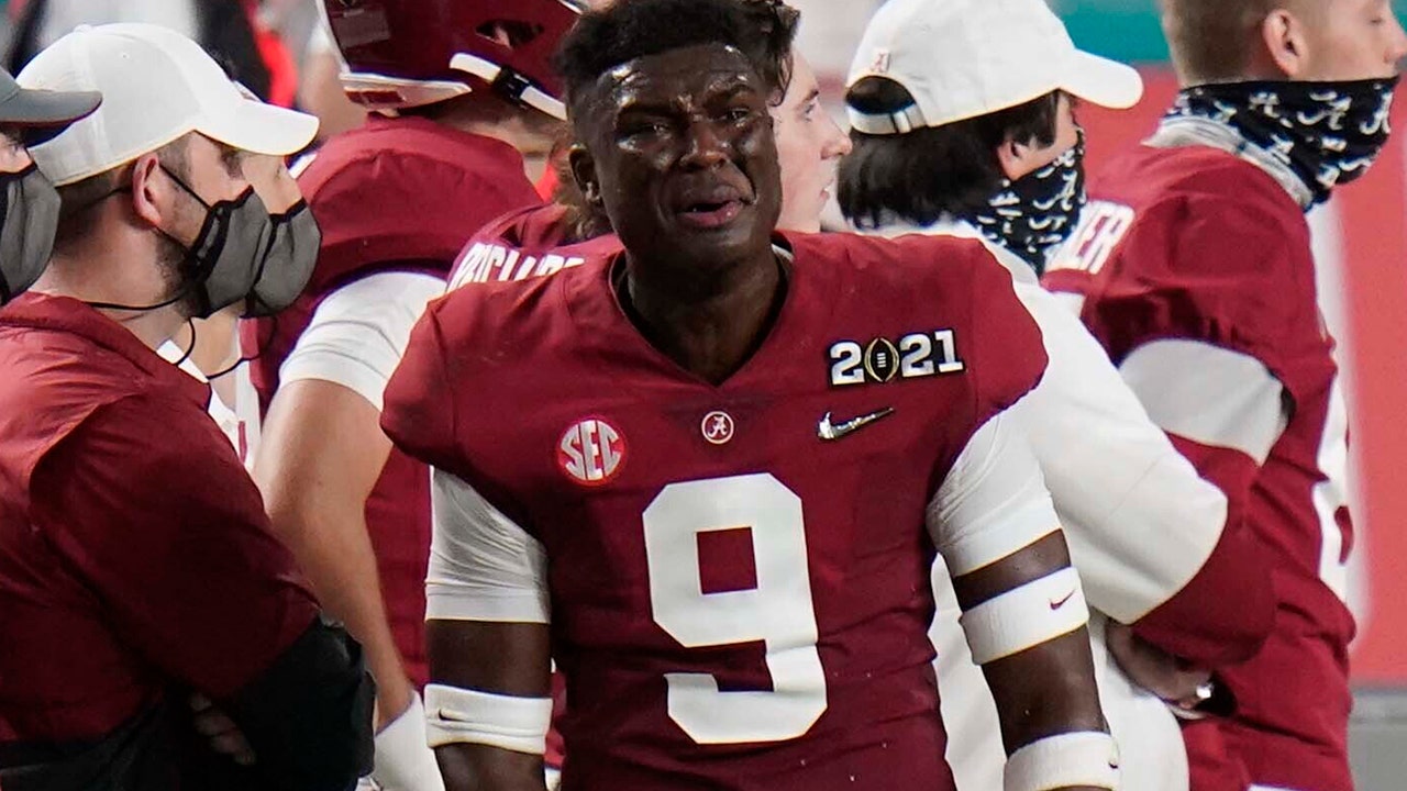 Alabama’s Jordan Battle was kicked out of the national title game, thrilled on the sides