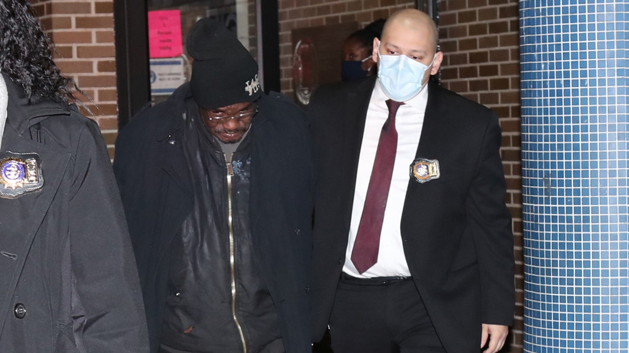 New Yorkers tell the serial killer suspect to ‘rot in hell!’  when he leaves the NYPD station