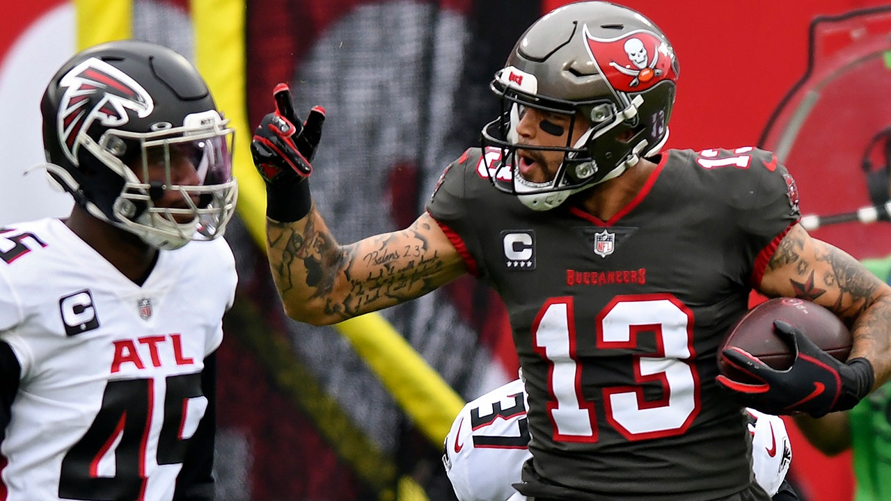 Mike Evans of Buccaneers sets record for receiving yard and leaves game with a narrow knee injury
