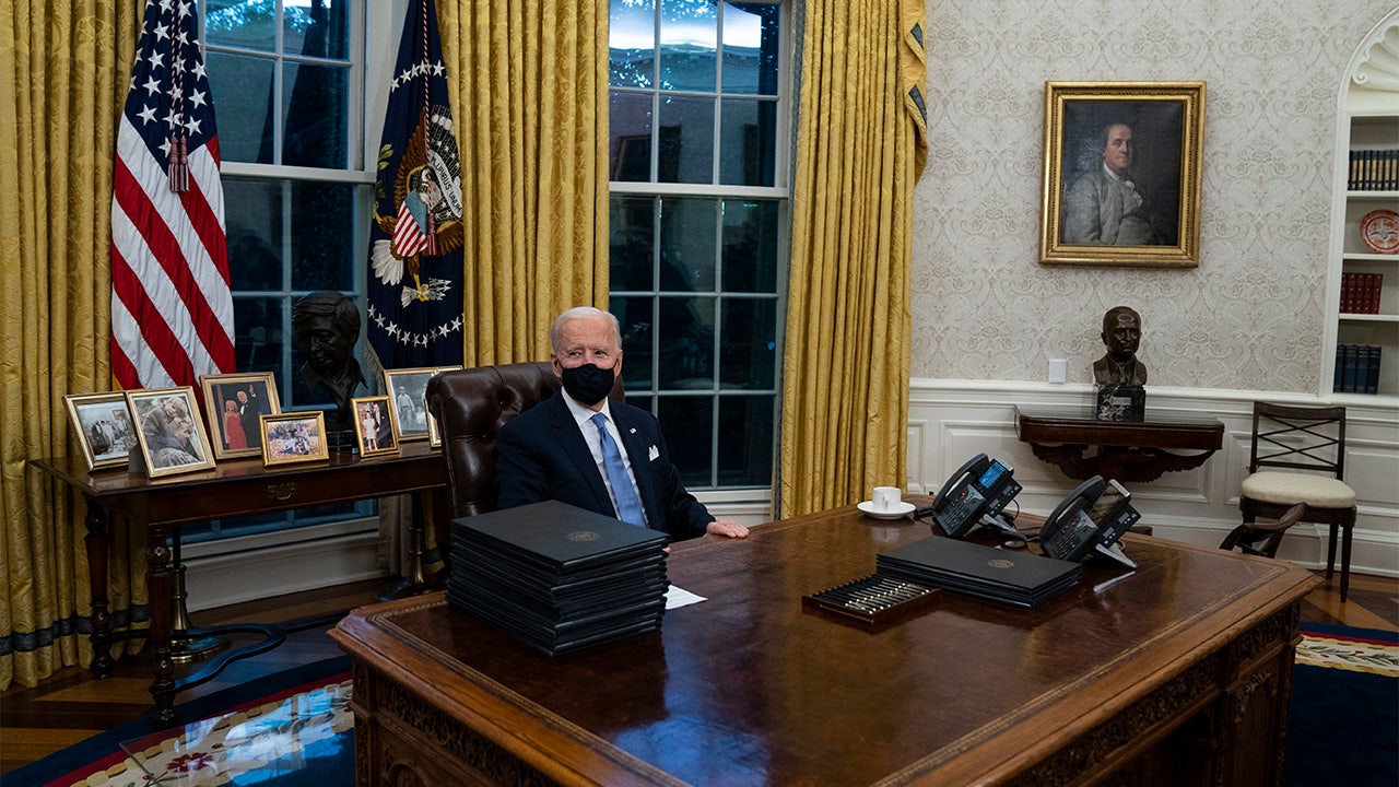 President Biden appears to remove Trump’s Diet Coke button from the Oval Office