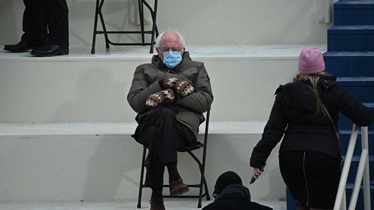 Photo of Bernie Sanders sitting alone in the cold at Biden’s inauguration takes off
