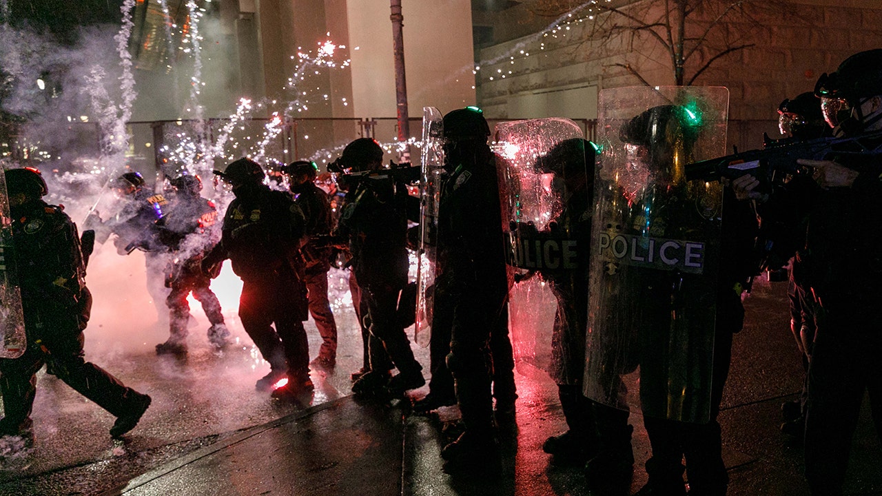 Armed private security fills police void in downtown Portland where riots, shootouts occurred