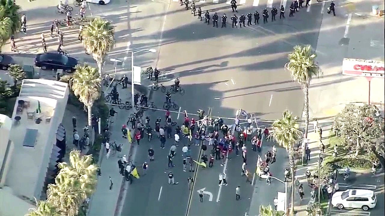 San Diego police declare ‘illegal meeting’ as Trump supporters face counter-protesters