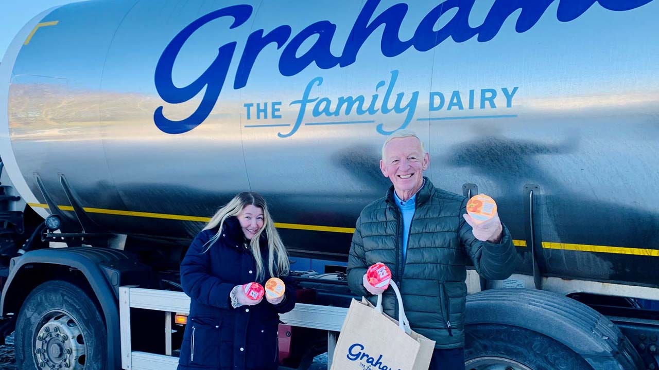 'Wonder woman' pushes truck up snowy hill, earns free milk for a year