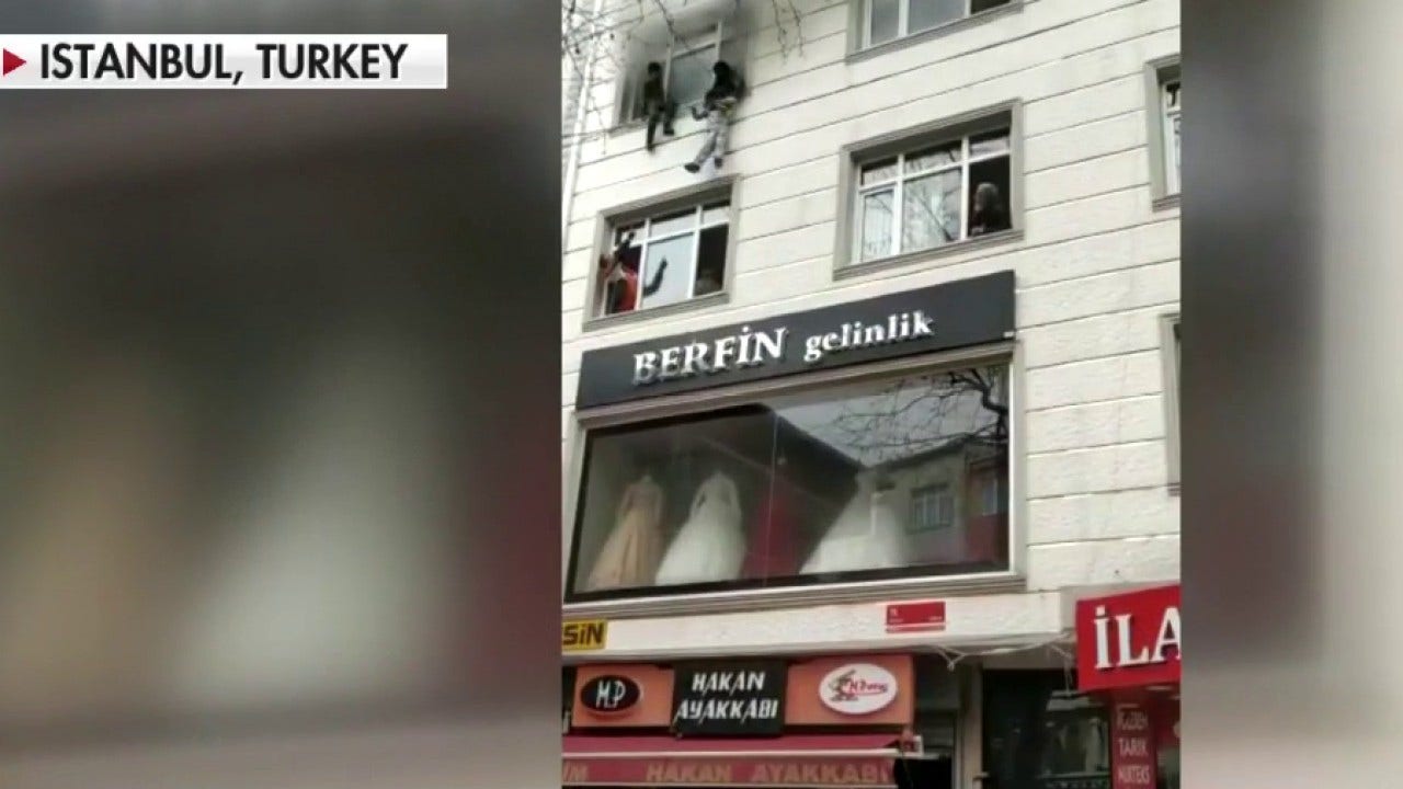 Istanbul mom throws 4 kids out of apartment window to save them from fire, video shows