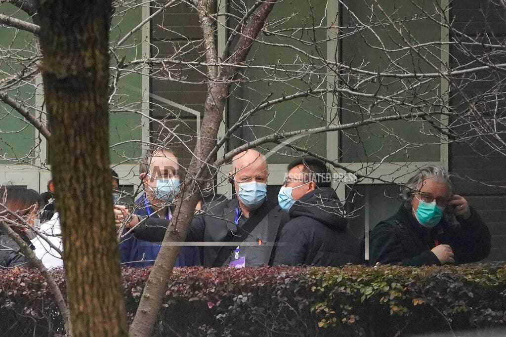 WHO team visits Wuhan virus laboratory, speculation center