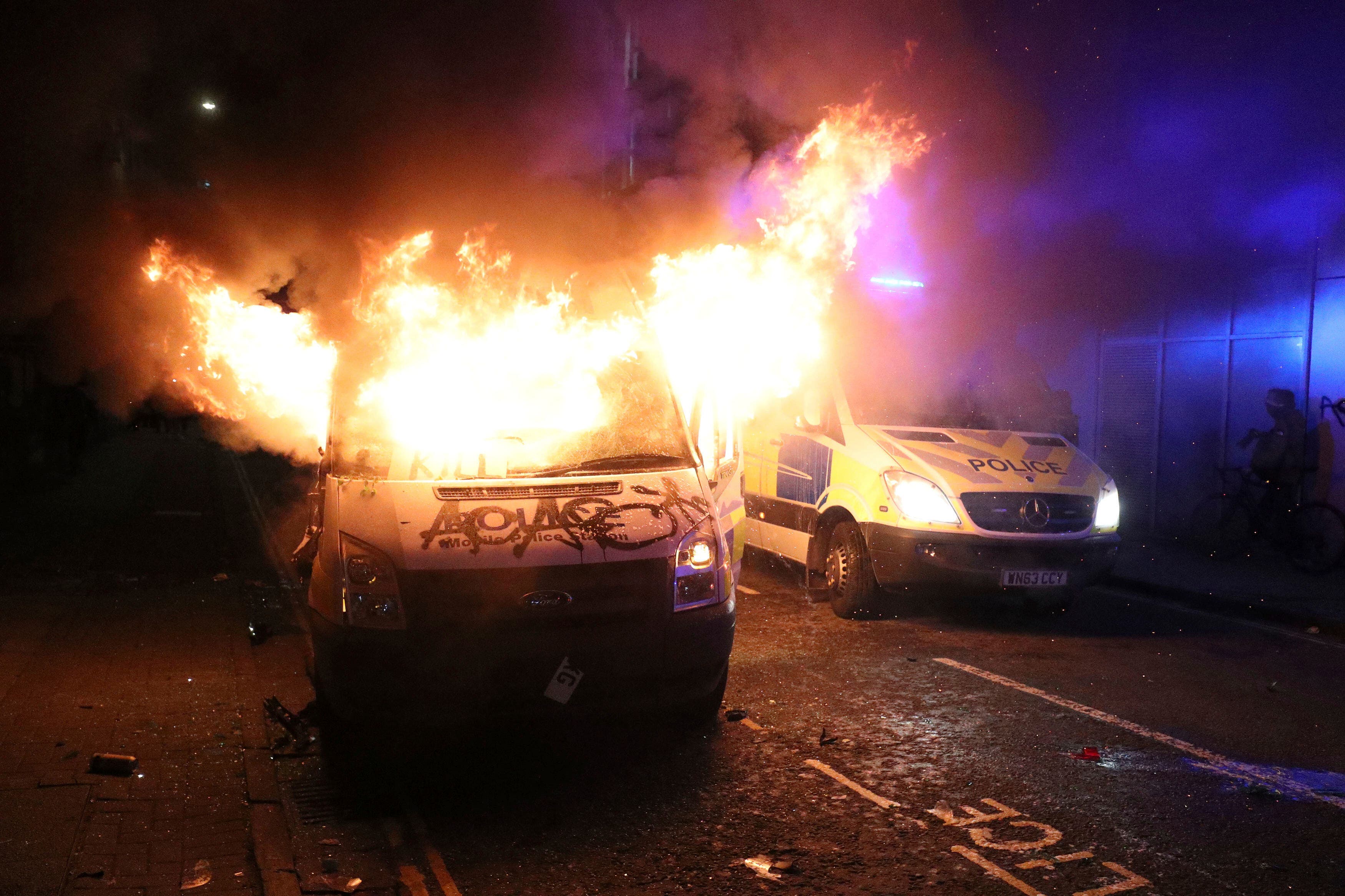 Police officers injured, vehicles set on fire during violent rally in Bristol, England