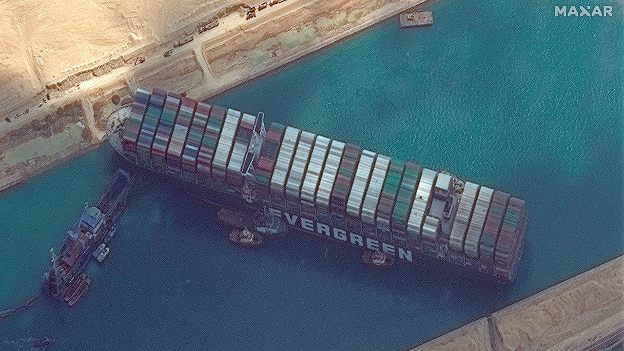 Navy sending team to Suez Canal to help dig out massive ship blocking passage: sources