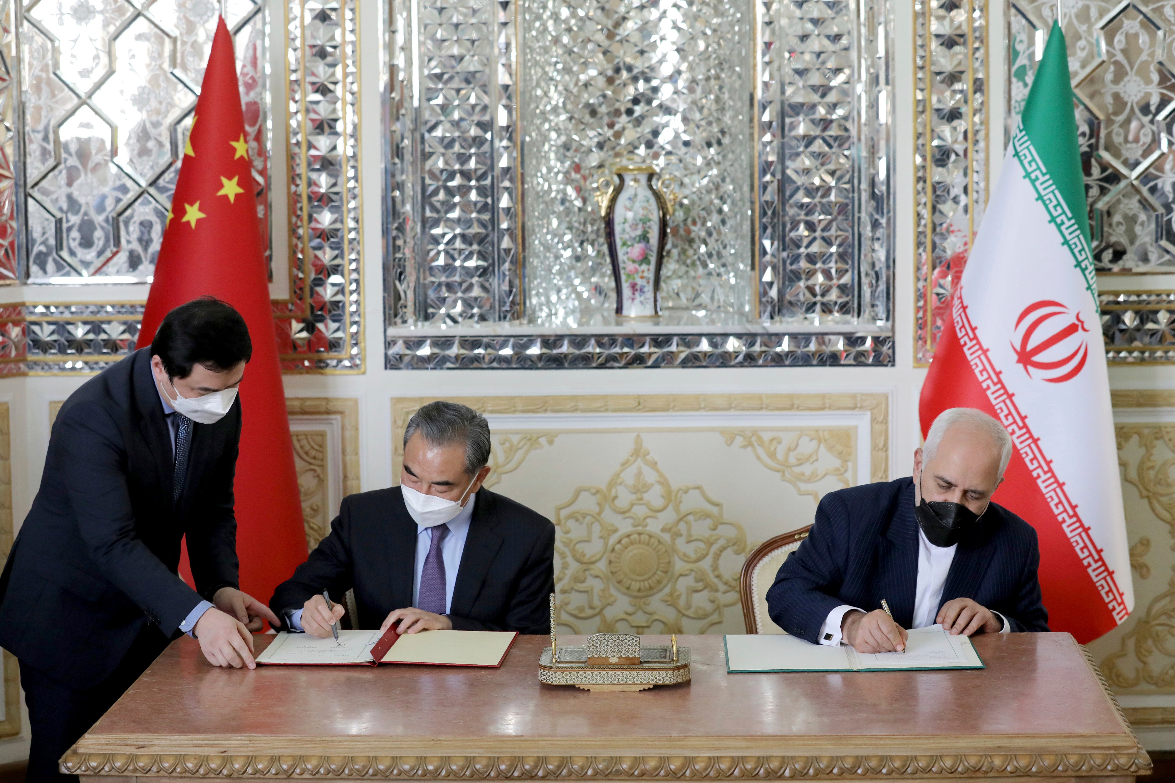 Iran, China sign deal to warn US against isolating them, professor says