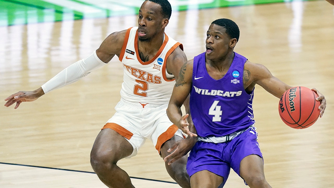 Abilene Christian defeated Texas in late free throws for the first NCAA Division I Tournament win in school history