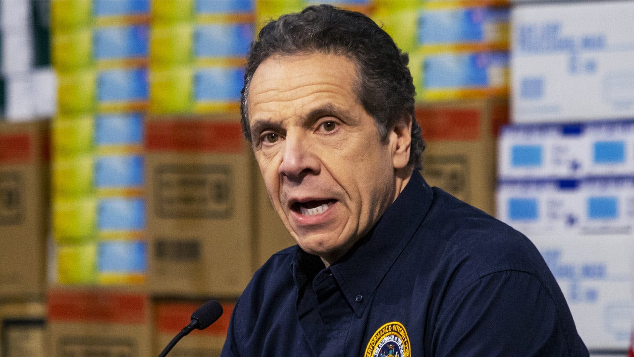 Andrew Cuomo and dog 'Captain' relax on a boat after former governor 'tried  to give the dog away