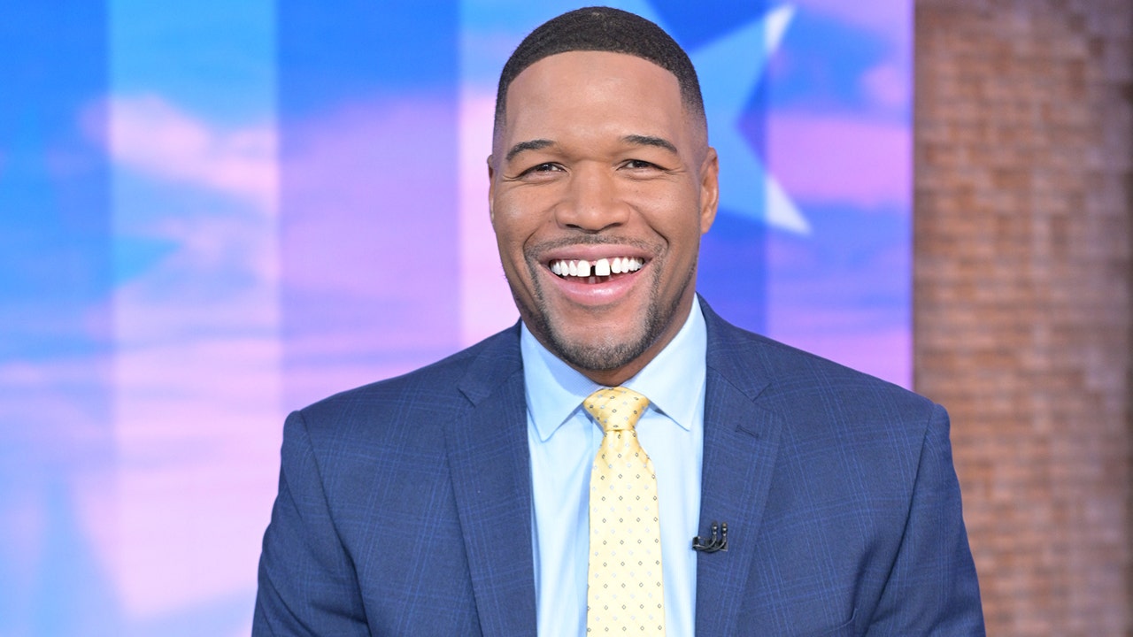 Michael Strahan seemingly closes famous tooth gap, sparks speculation it's an elaborate April Fools' prank