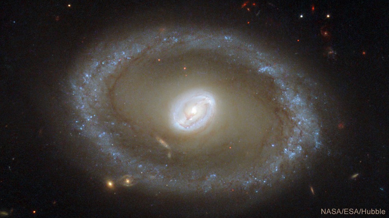 NASA's Chandra Observatory looking at barred spiral galaxy 86 million light-years away