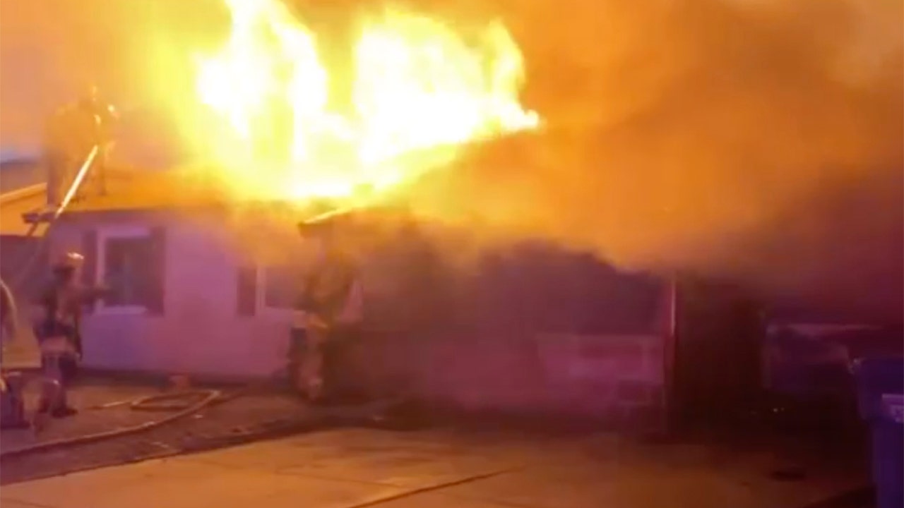 Phoenix police officer rescues family from burning home