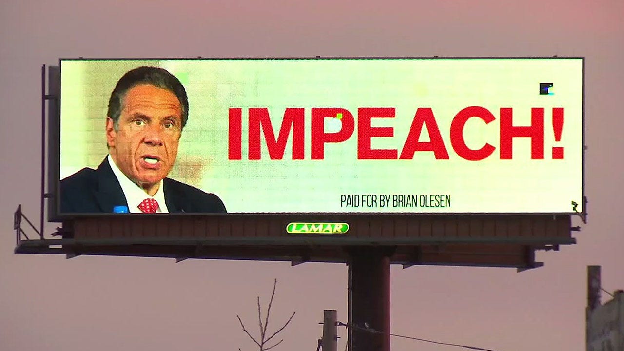 Cuomo targeted with 'resign now!' billboard amid dueling scandals