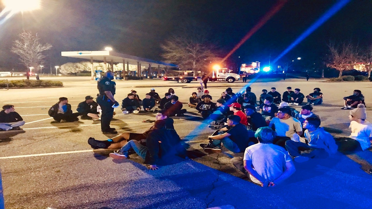 Georgia police arrest 102 suspected street racers after trapping them in parking lot