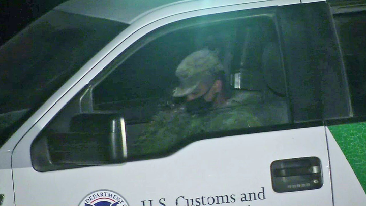 National Guard troops patrolling the border are found sleeping in a vehicle while migrants wait to surrender