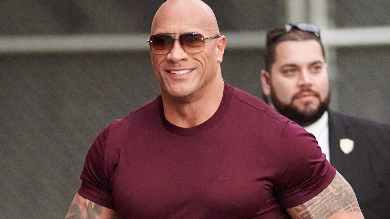 Dwayne 'The Rock' Johnson shows off the large fish he raises as a hobby